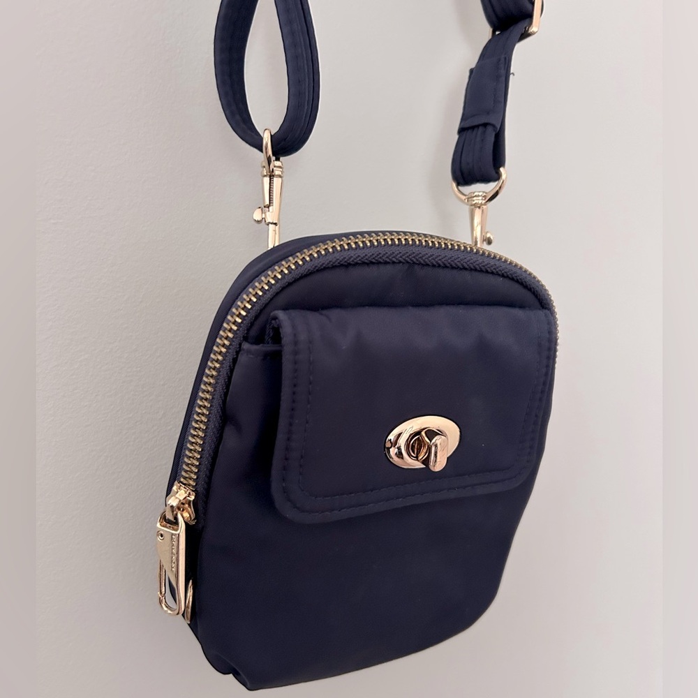 Travelon Anti-Theft Tailored Crossbody Phone Pouch - Sapphire, gold accents - Picture 5 of 11